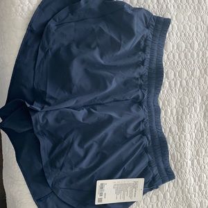 Never worn, size 18 Lululemon Track That Short 3”